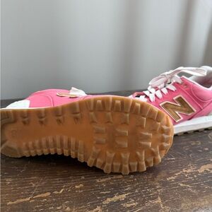 New Balance Pink and Gold Athletic Shoes